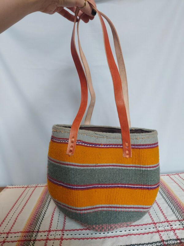 Woven wool bag with leather straps