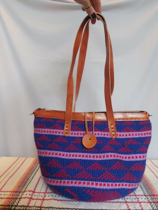 Woven wool bag with leather straps