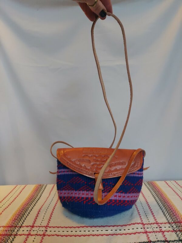 Woven wool bag with leather straps