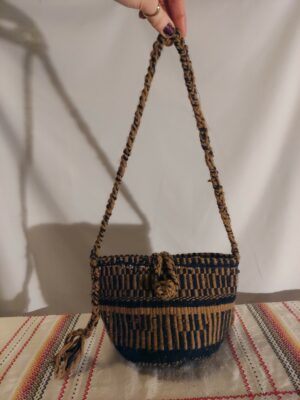 Woven wool bag with woven wool strap